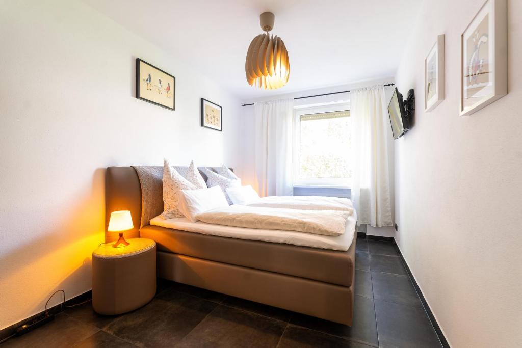 Ein Bett oder Betten in einem Zimmer der Unterkunft Apartment ECH Königsberger