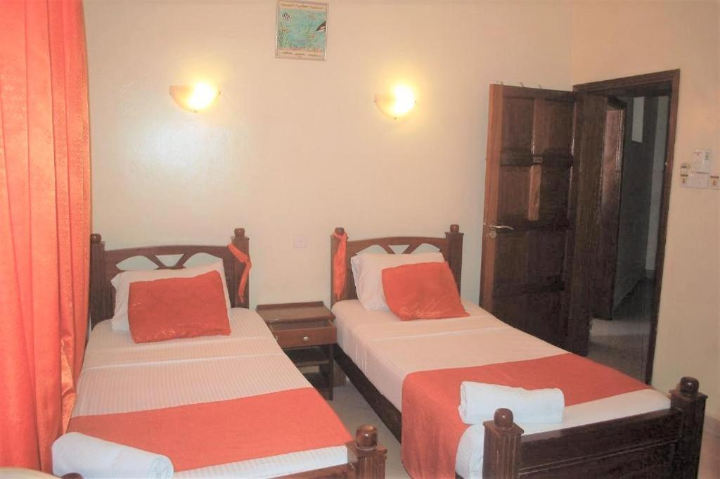 Postel nebo postele na pokoji v ubytování Regency Park Hotel