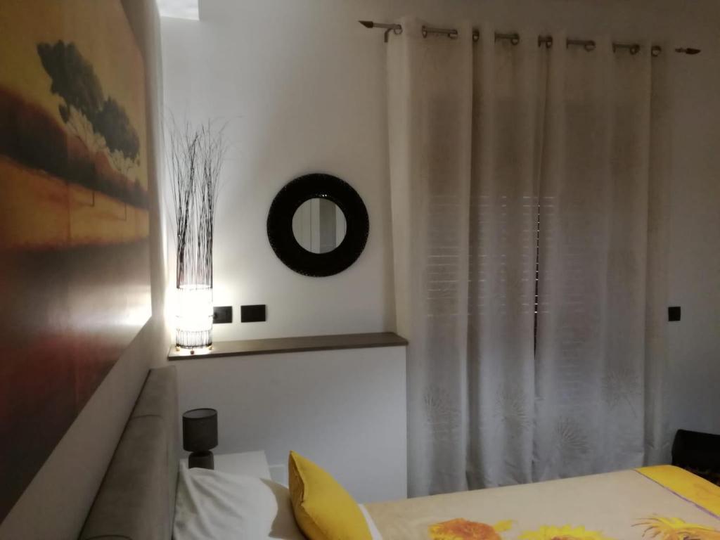 Łóżko lub łóżka w pokoju w obiekcie La casa di Ale