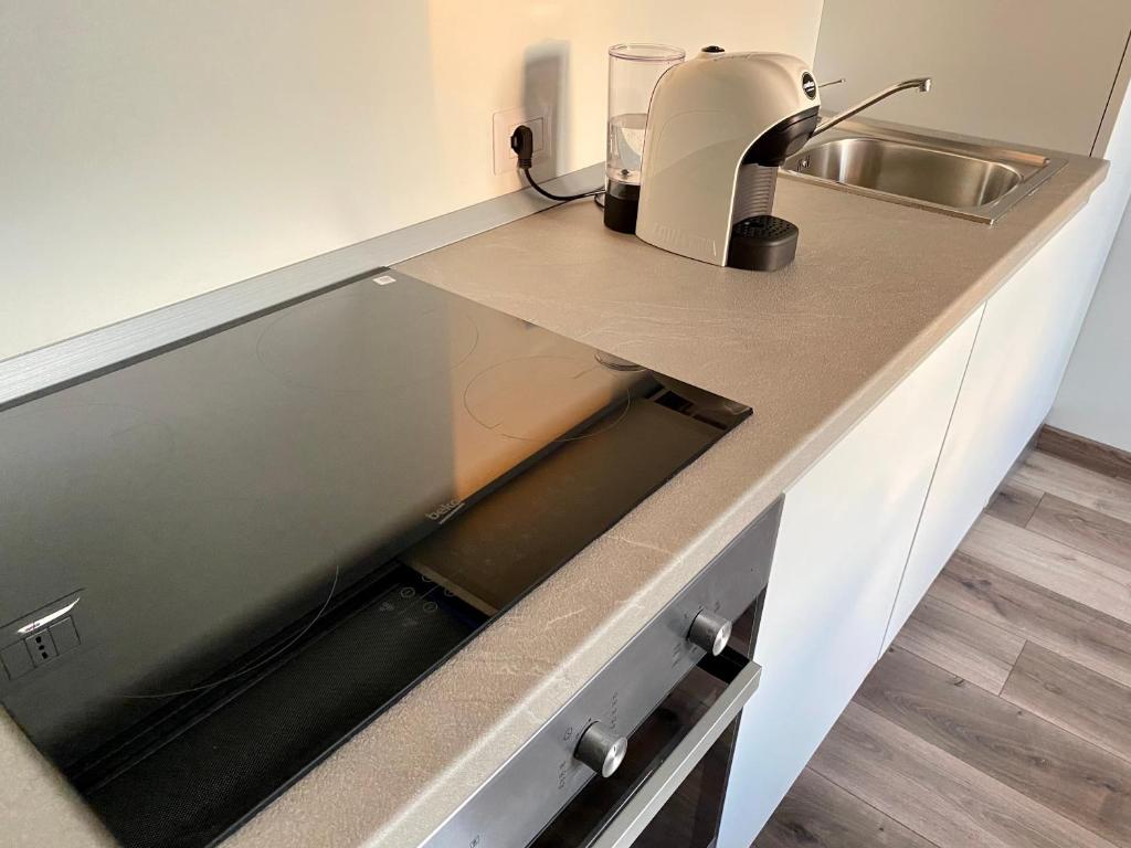 A kitchen or kitchenette at Suite boutique Moscova