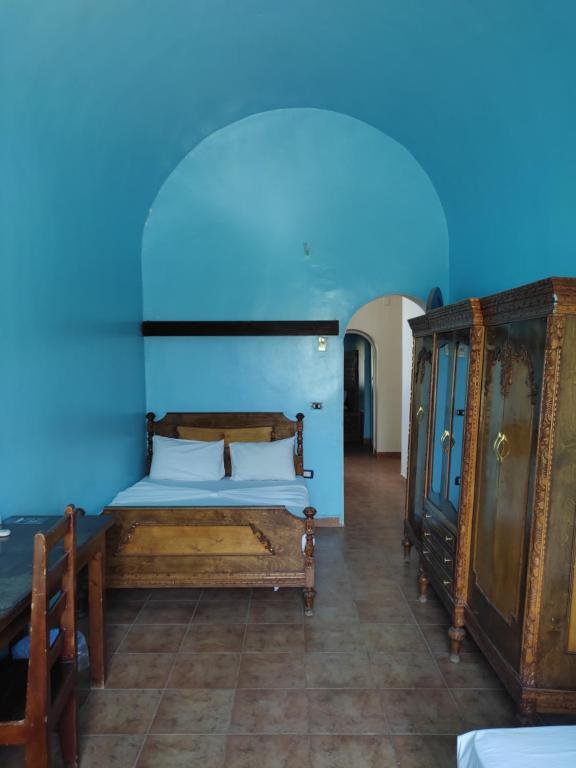 Postel nebo postele na pokoji v ubytování Nubian Holiday House Aswan