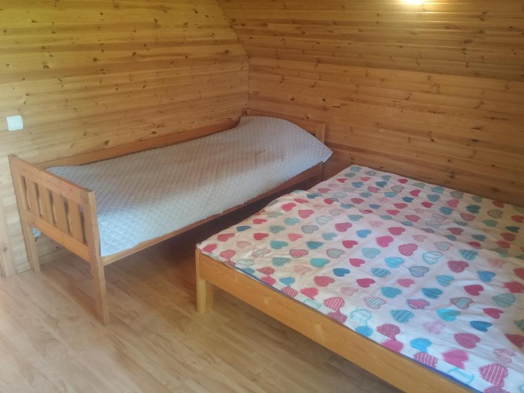 Postel nebo postele na pokoji v ubytování Aratsaare Holiday home