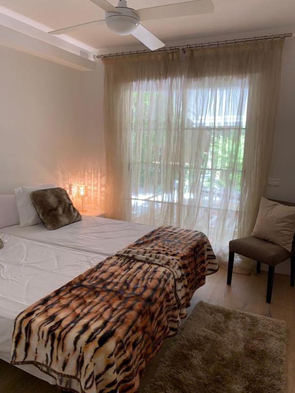 Postel nebo postele na pokoji v ubytování Marbella playa Residencial con piscina