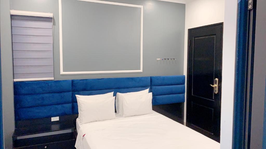 Postel nebo postele na pokoji v ubytování Hotel Red River