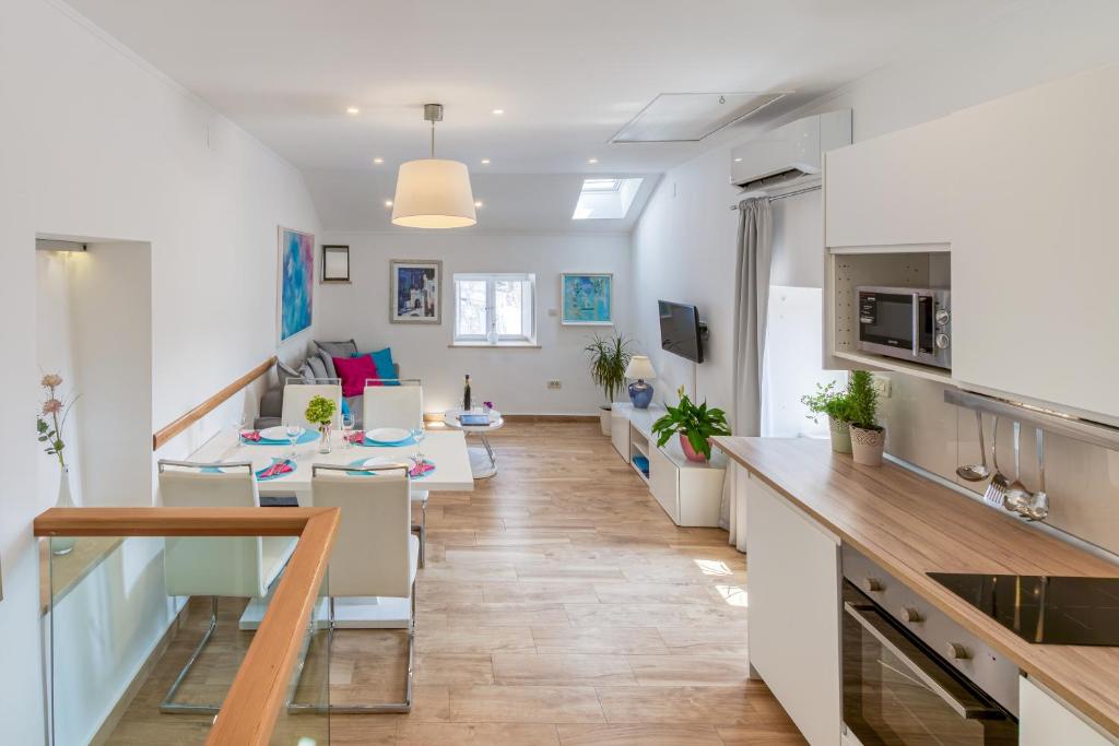 Kuchyň nebo kuchyňský kout v ubytování San Pietro apartment