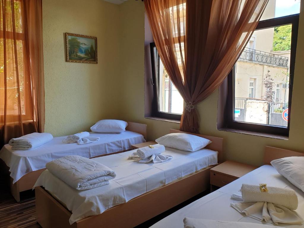 Posteľ alebo postele v izbe v ubytovaní KM!Sofia - Стаи за гости
