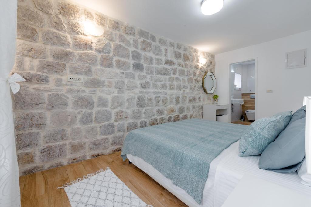 Postel nebo postele na pokoji v ubytování San Pietro apartment