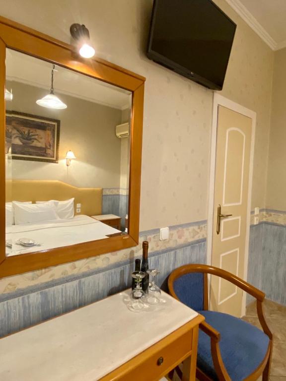 TV a/nebo společenská místnost v ubytování Arma Faliro Apartments