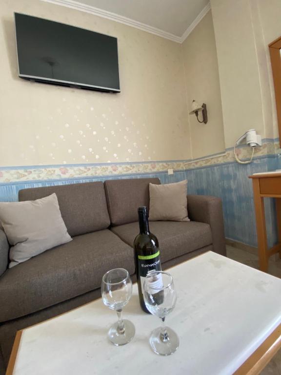 TV a/nebo společenská místnost v ubytování Arma Faliro Apartments