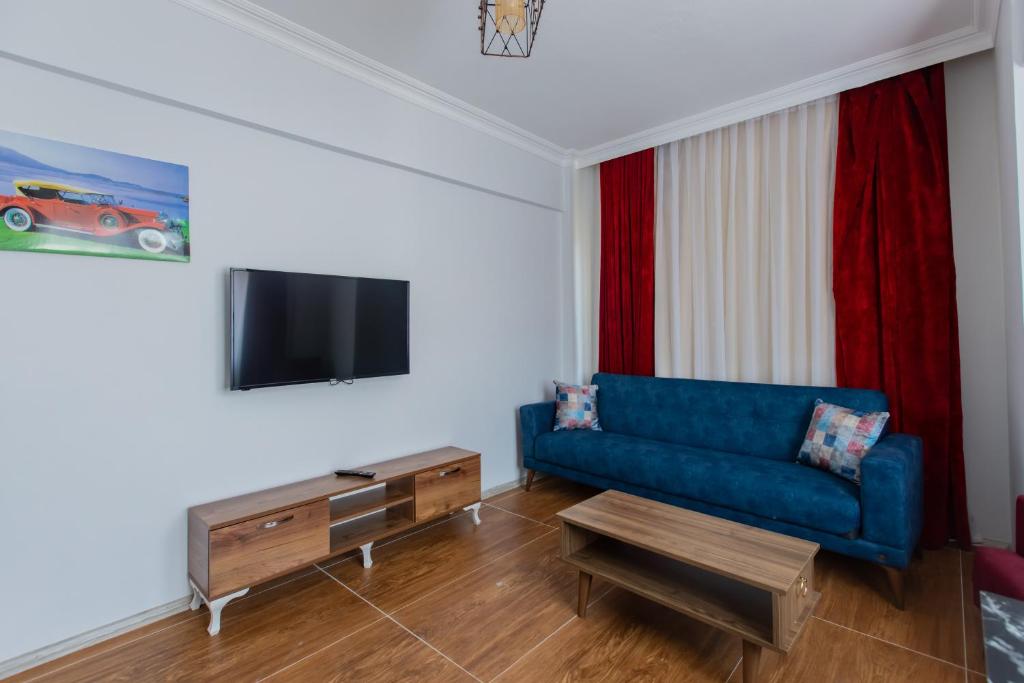 TV a/nebo společenská místnost v ubytování Bellissima Hotel