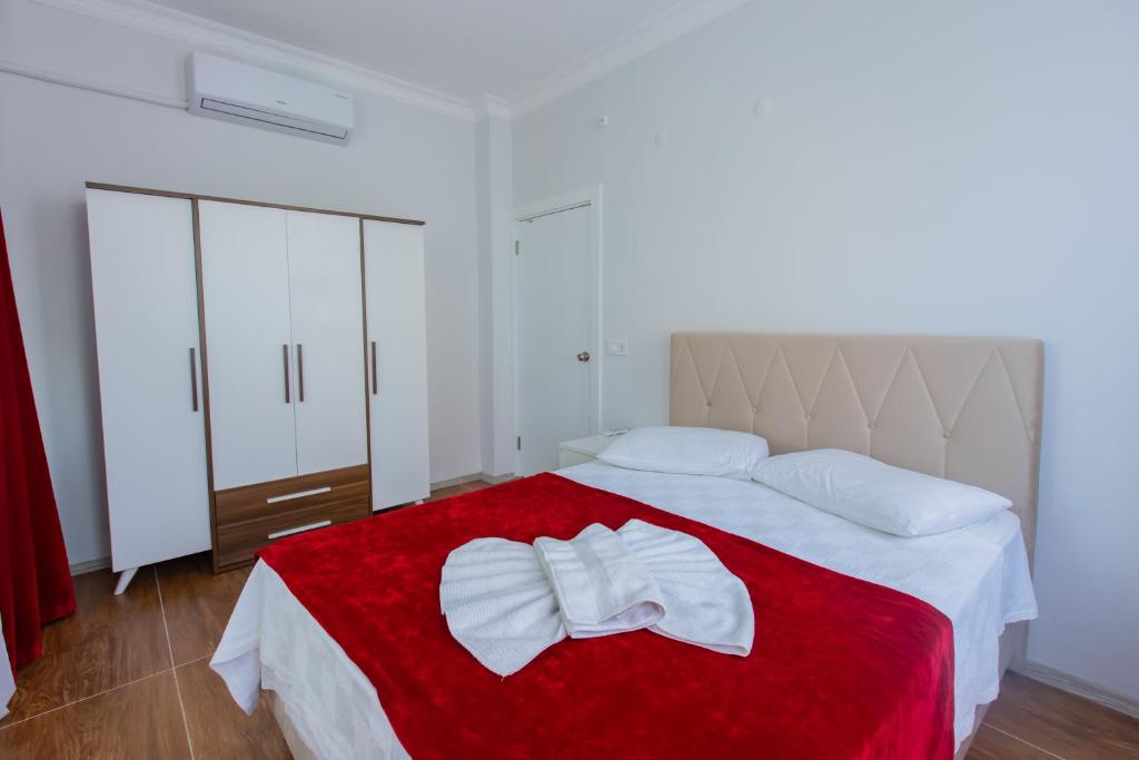 Postel nebo postele na pokoji v ubytování Bellissima Hotel