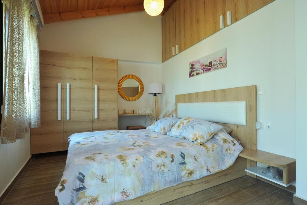 Posteľ alebo postele v izbe v ubytovaní Giannitsa's House