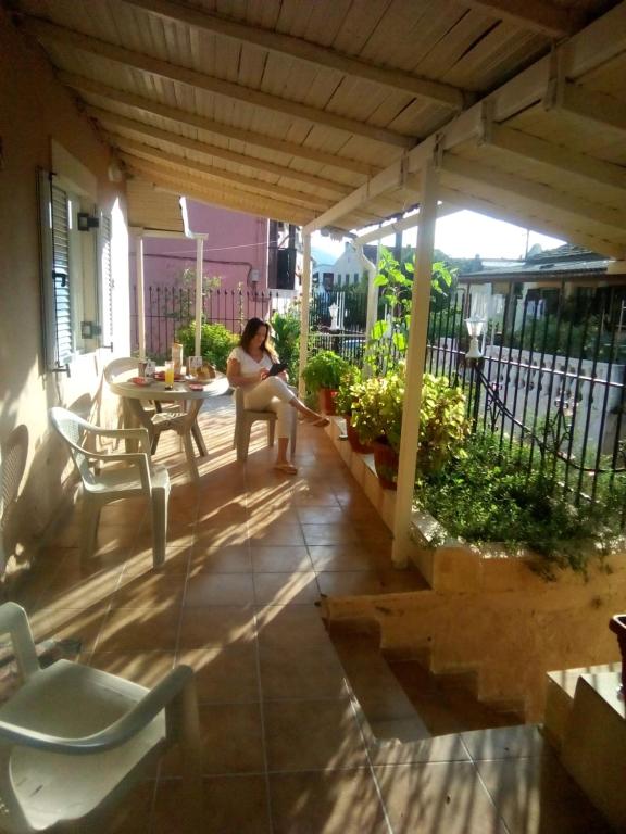 A balcony or terrace at Villa Angela, Traditional Villa in the village