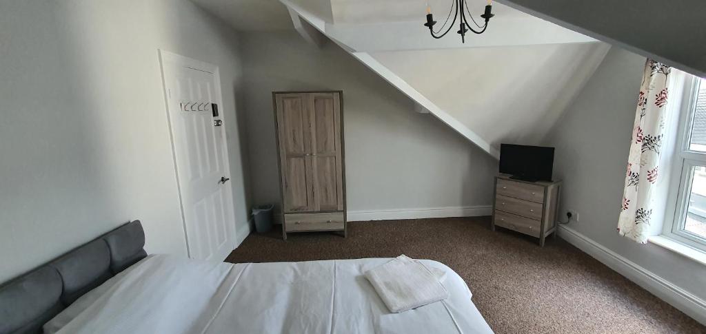 Postel nebo postele na pokoji v ubytování APARTMENT in CENTRAL DONCASTER