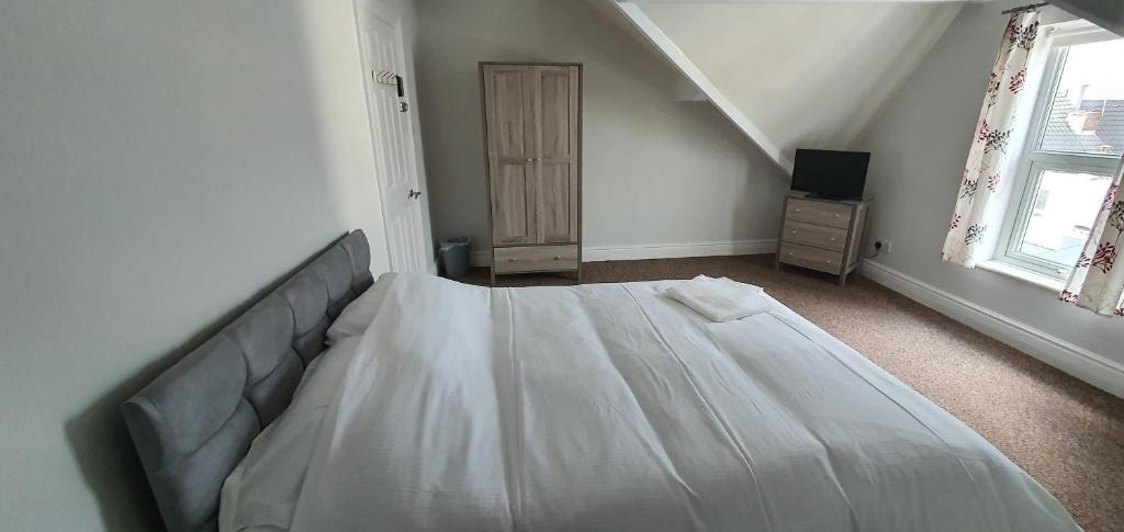 Postel nebo postele na pokoji v ubytování APARTMENT in CENTRAL DONCASTER
