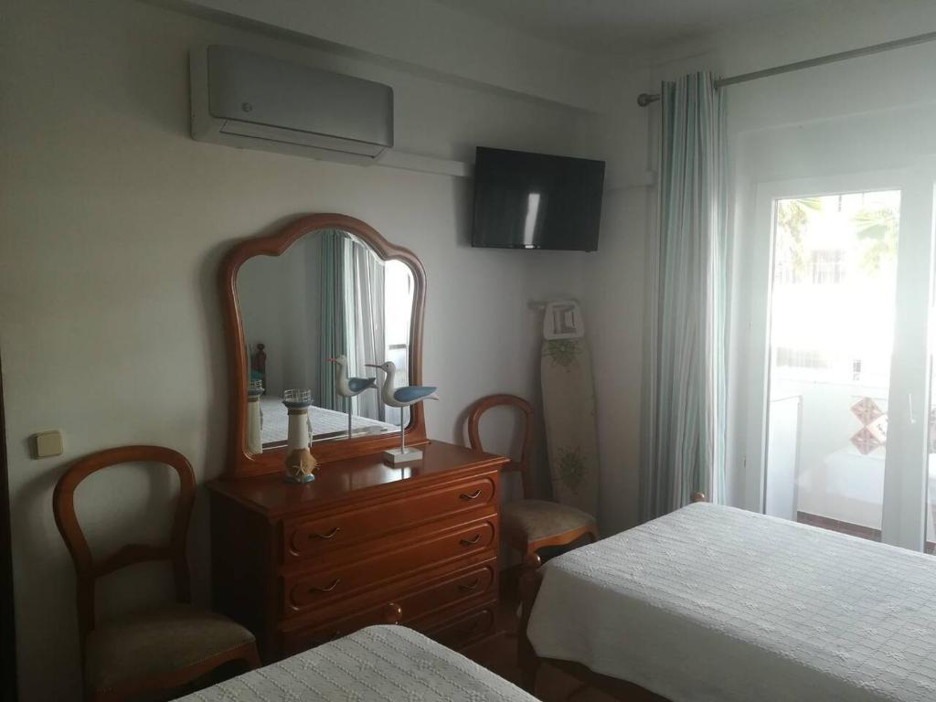 Postel nebo postele na pokoji v ubytování 1 bedroom holidays apartment in Quarteira Algarve