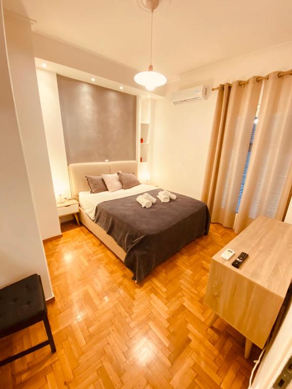 Posteľ alebo postele v izbe v ubytovaní Studio 32m2 Nefitou Metaxa