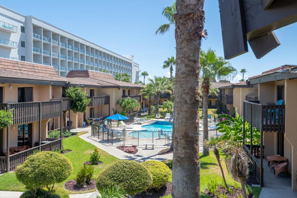a view of the courtyard of a resort with a pool at Tiki 259 in South Padre Island