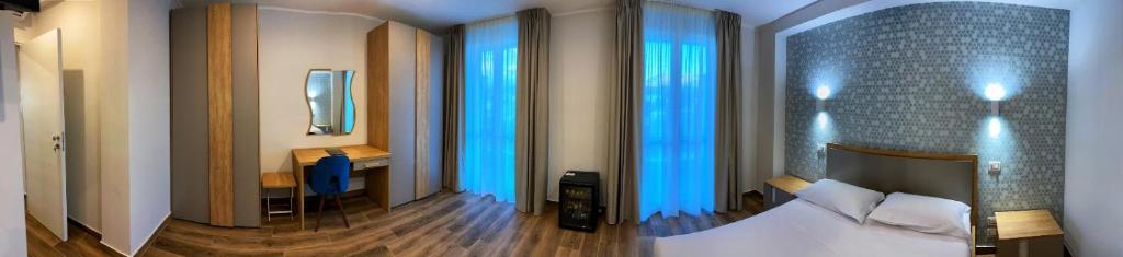 Postel nebo postele na pokoji v ubytování Lumarooms B&B