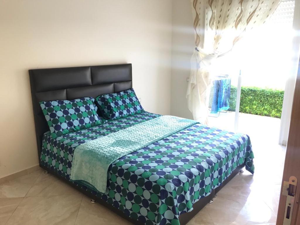 Кровать или кровати в номере Rès,LES JARDINS DE BUZNIKA 2GH A 2