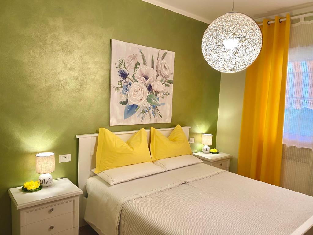 Postel nebo postele na pokoji v ubytování Residenza Airone Bianco