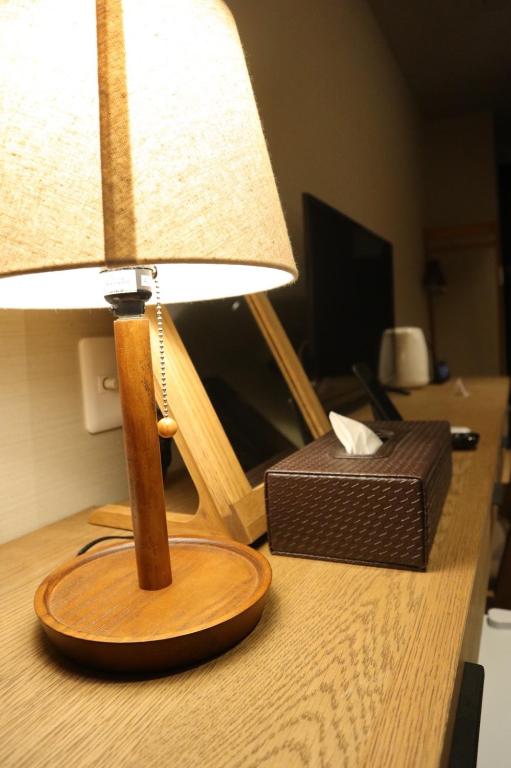 TV a/nebo společenská místnost v ubytování ikoi HOTEL
