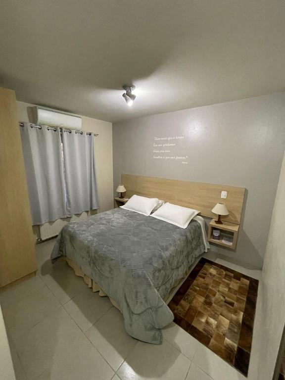 Postel nebo postele na pokoji v ubytování Pousada Pinhão e Poesia