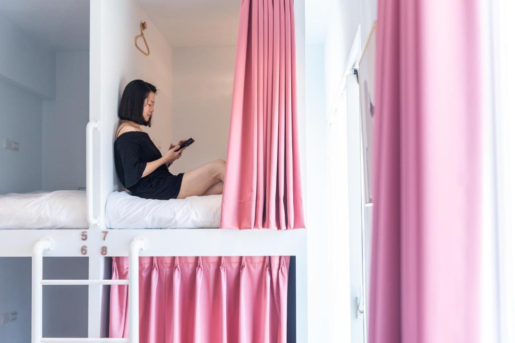 Postel nebo postele na pokoji v ubytování W3 HOSTEL