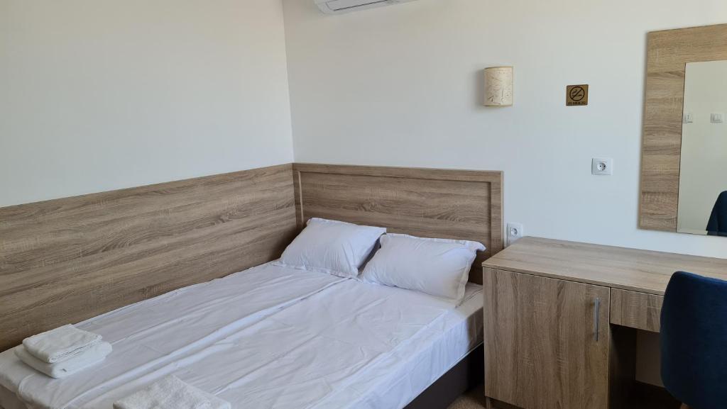Postel nebo postele na pokoji v ubytování Hotel Geppy