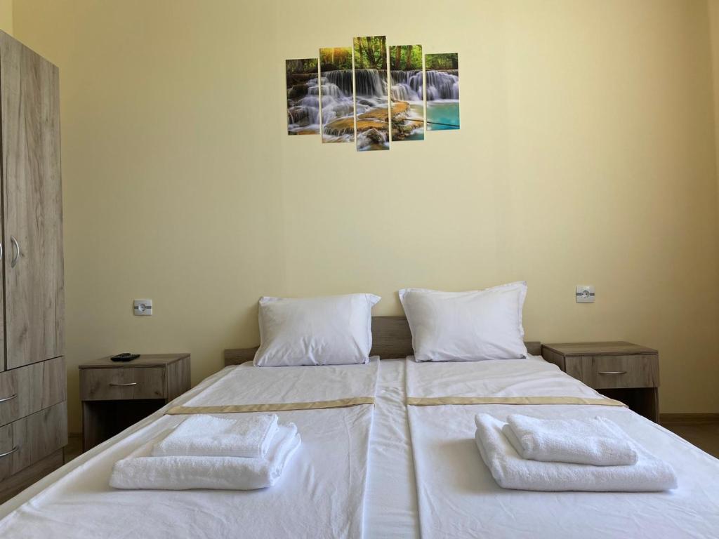 Postel nebo postele na pokoji v ubytování Hotel Sunrise