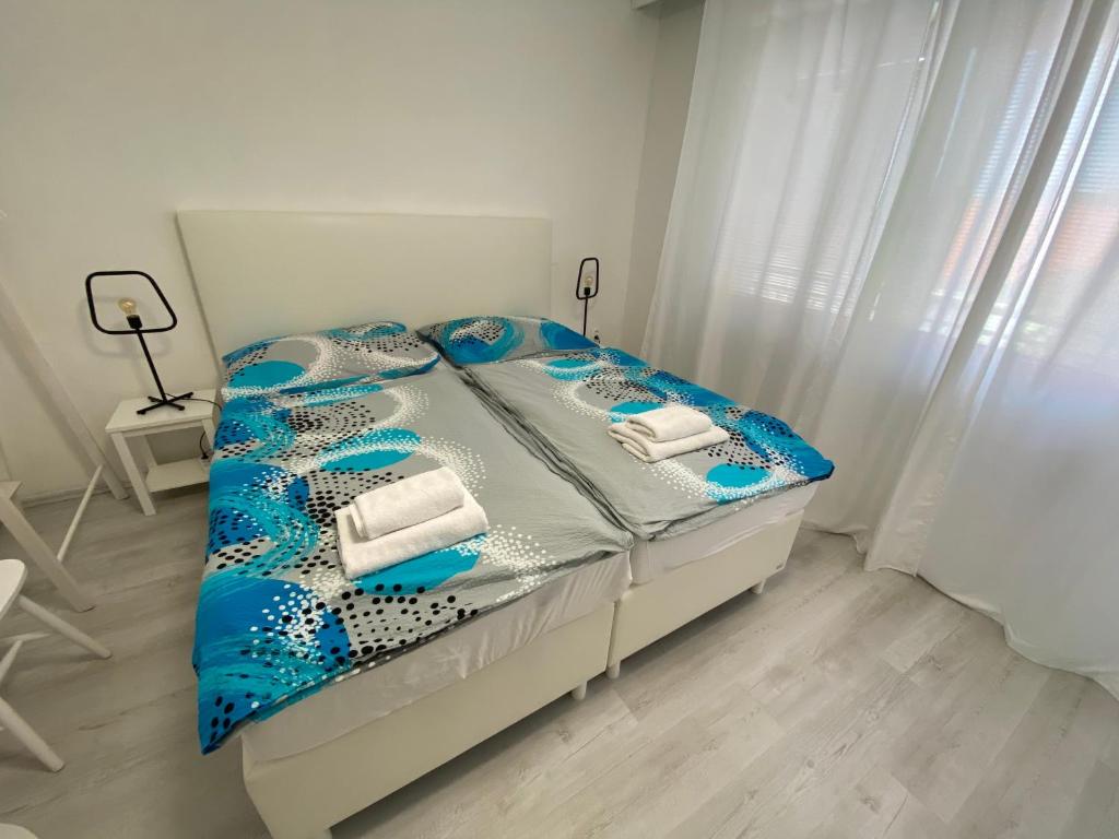 Postel nebo postele na pokoji v ubytování Penzión Oáza