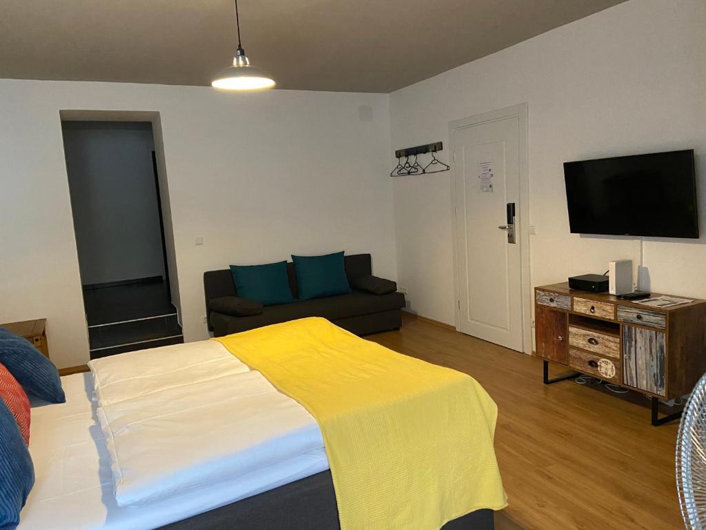 Telewizja i/lub zestaw kina domowego w obiekcie Schottenring City Stock Exchange Apartments