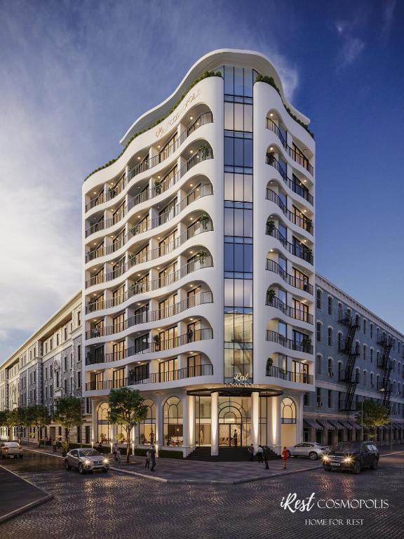 a rendering of a large white building at iRest COSMOPOLIS Vinh Yen in Yen