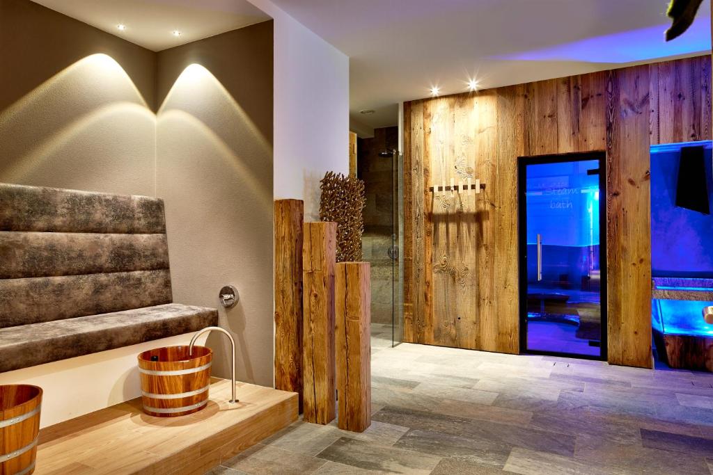 TV a/nebo společenská místnost v ubytování Hotel Costes