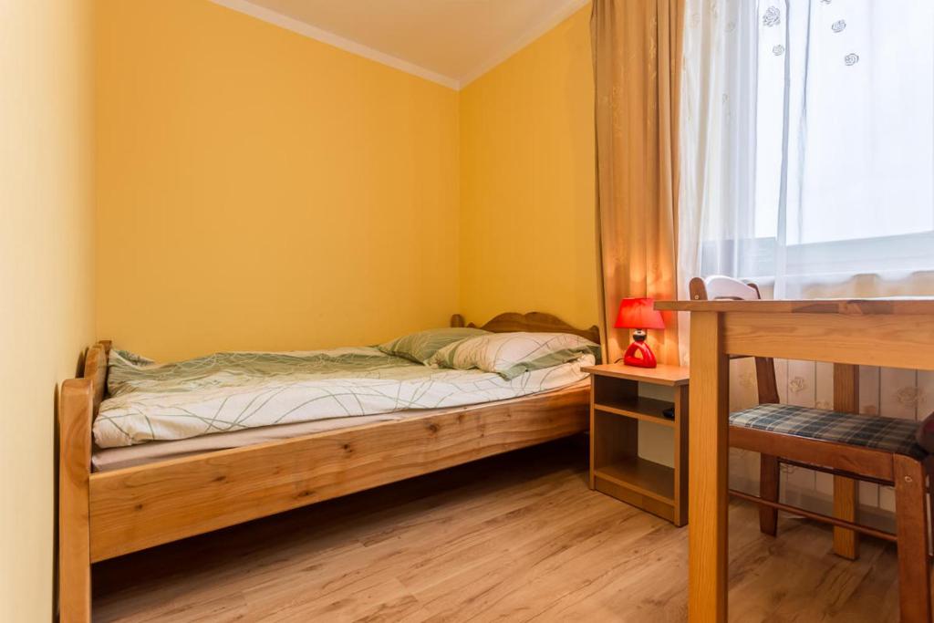 Posteľ alebo postele v izbe v ubytovaní POKOJE u JÓZKA