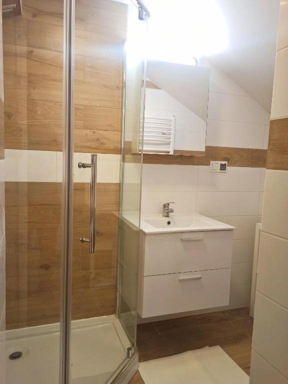 Koupelna v ubytování Apartamenty W Domu