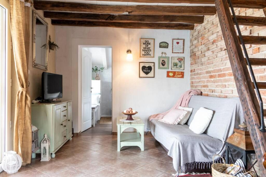 Televízia a/alebo spoločenská miestnosť v ubytovaní Holiday home Parma