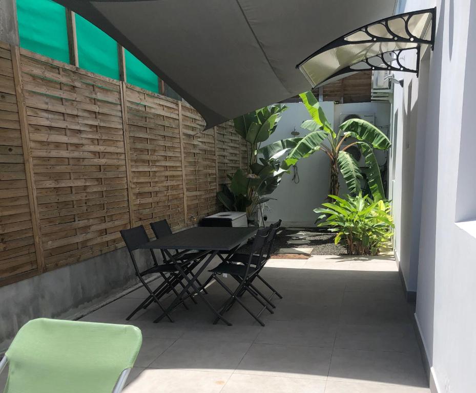 Patio nebo venkovní prostory v ubytování Le DAMOUR Appartement 1 ou 2 chambres