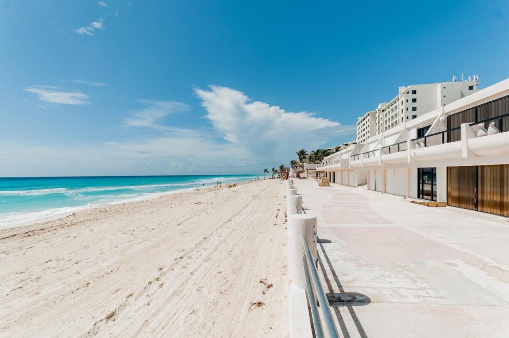 a view of the beach in front of a hotel at HotelZone L20 Beach Access in Cancún