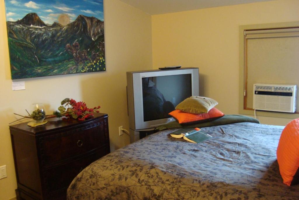 Postel nebo postele na pokoji v ubytování YPC Fitness & Accomodations