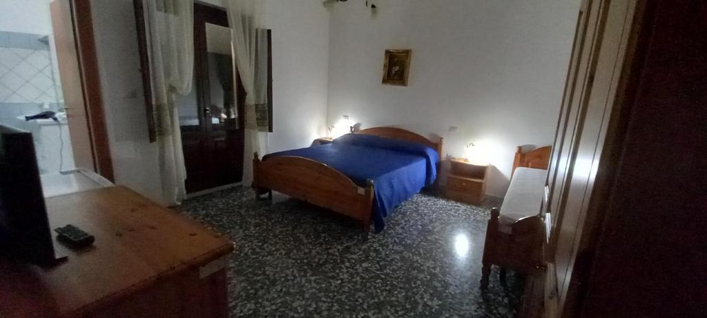 Łóżko lub łóżka w pokoju w obiekcie Casa Vacanze Primula palinuri