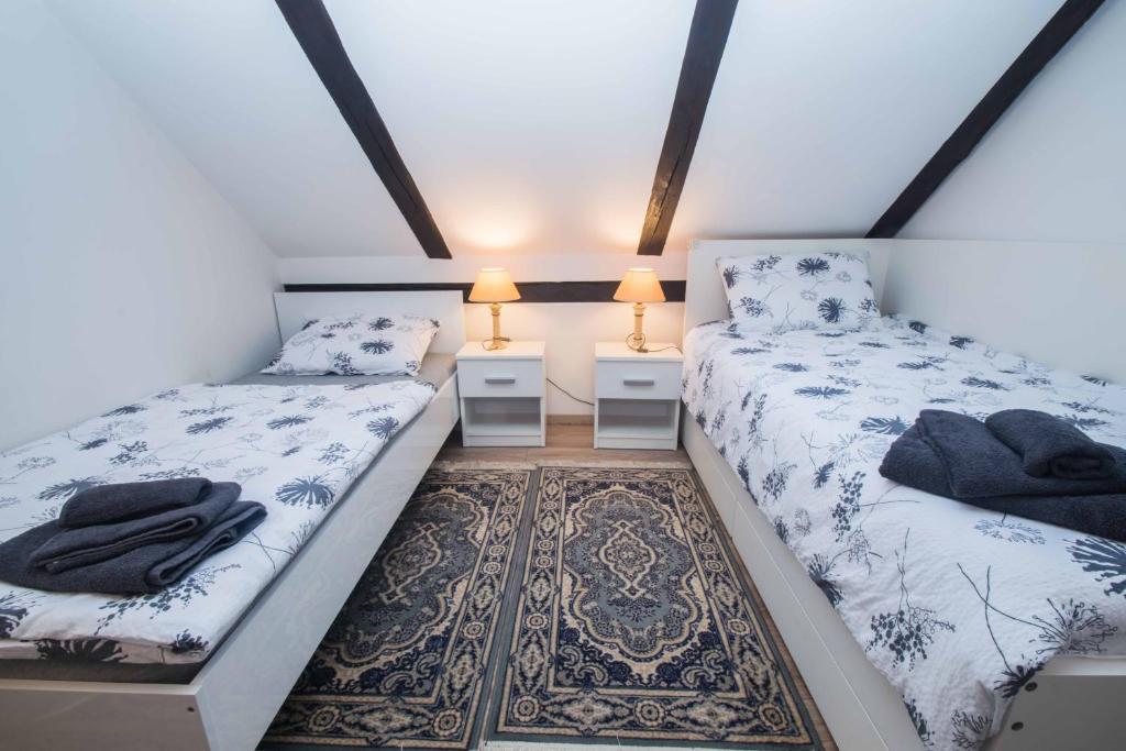 Postel nebo postele na pokoji v ubytování Apartman Jozefina