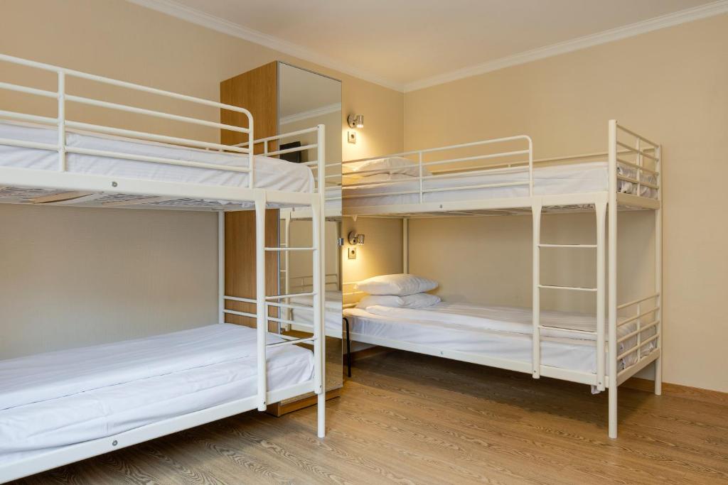 Postel nebo postele na pokoji v ubytování Göteborgs Mini-Hotel