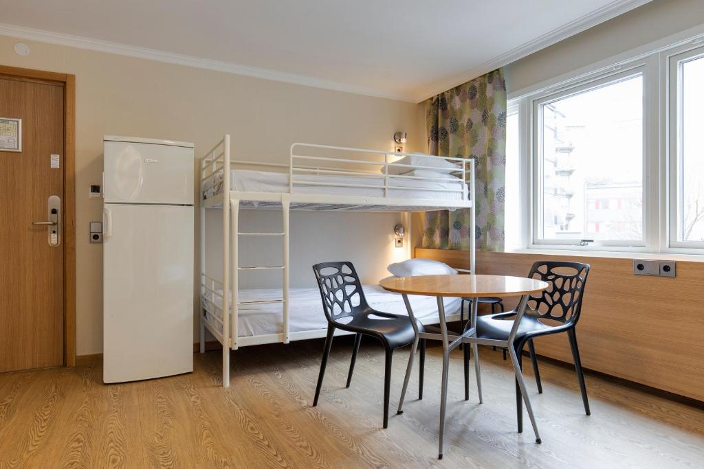 Kuchyň nebo kuchyňský kout v ubytování Göteborgs Mini-Hotel