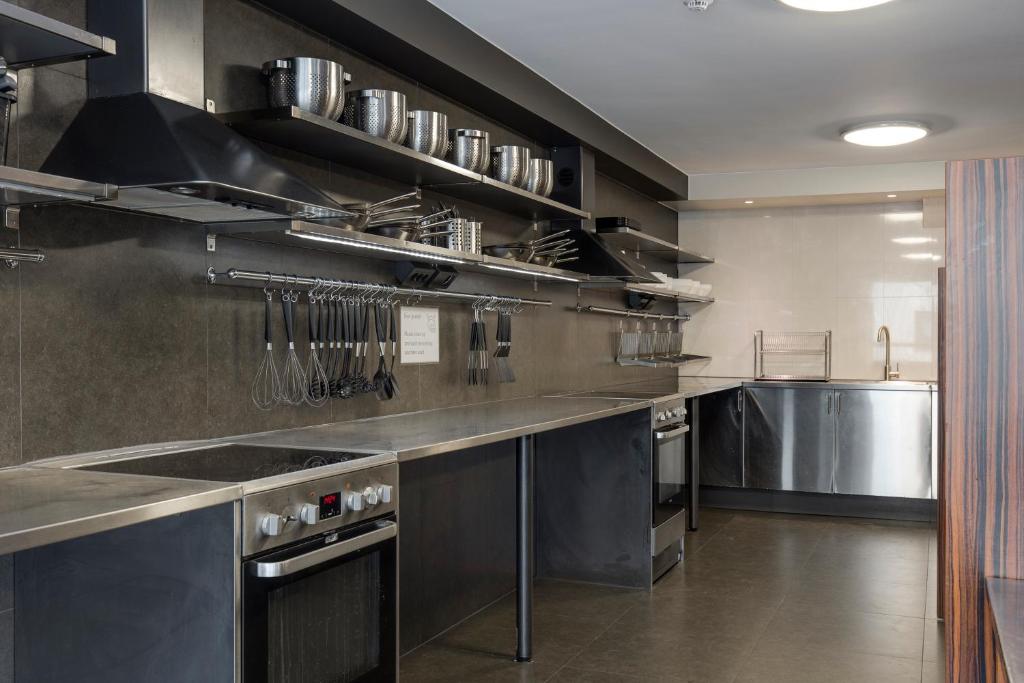 Kuchyň nebo kuchyňský kout v ubytování Göteborgs Mini-Hotel