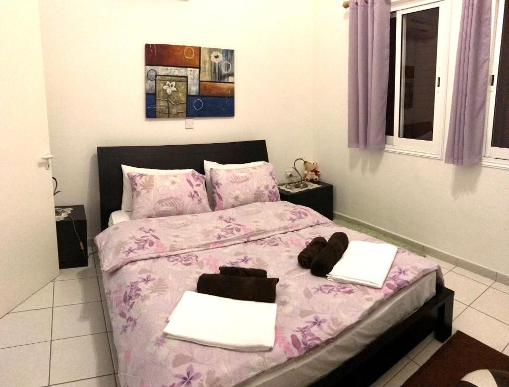 Postel nebo postele na pokoji v ubytování Owls Nest Townhouse