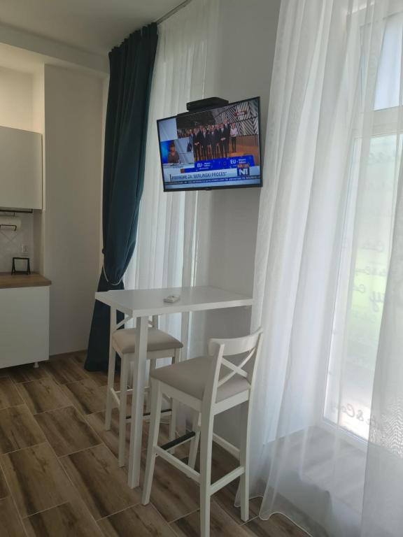 TV o dispositivi per l'intrattenimento presso Apartman Cute&Cosy
