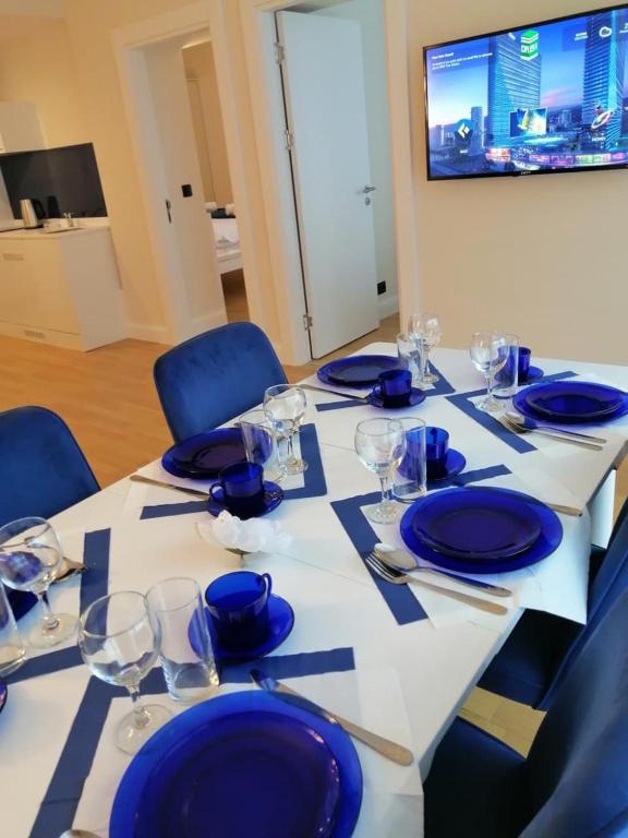 TV a/nebo společenská místnost v ubytování G-Point City Beach