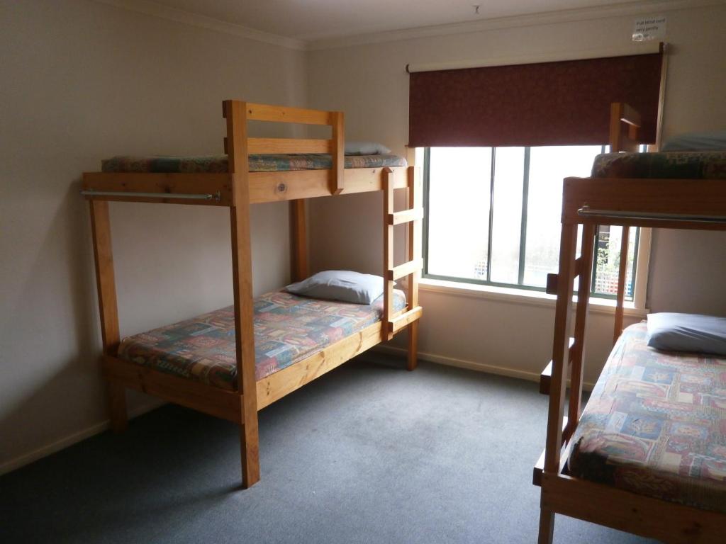 Postel nebo postele na pokoji v ubytování Launceston Backpackers