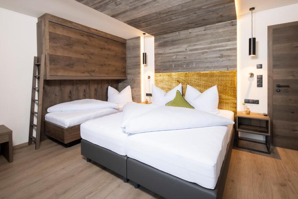 Postel nebo postele na pokoji v ubytování Stocker´s Wohlfühlapartments